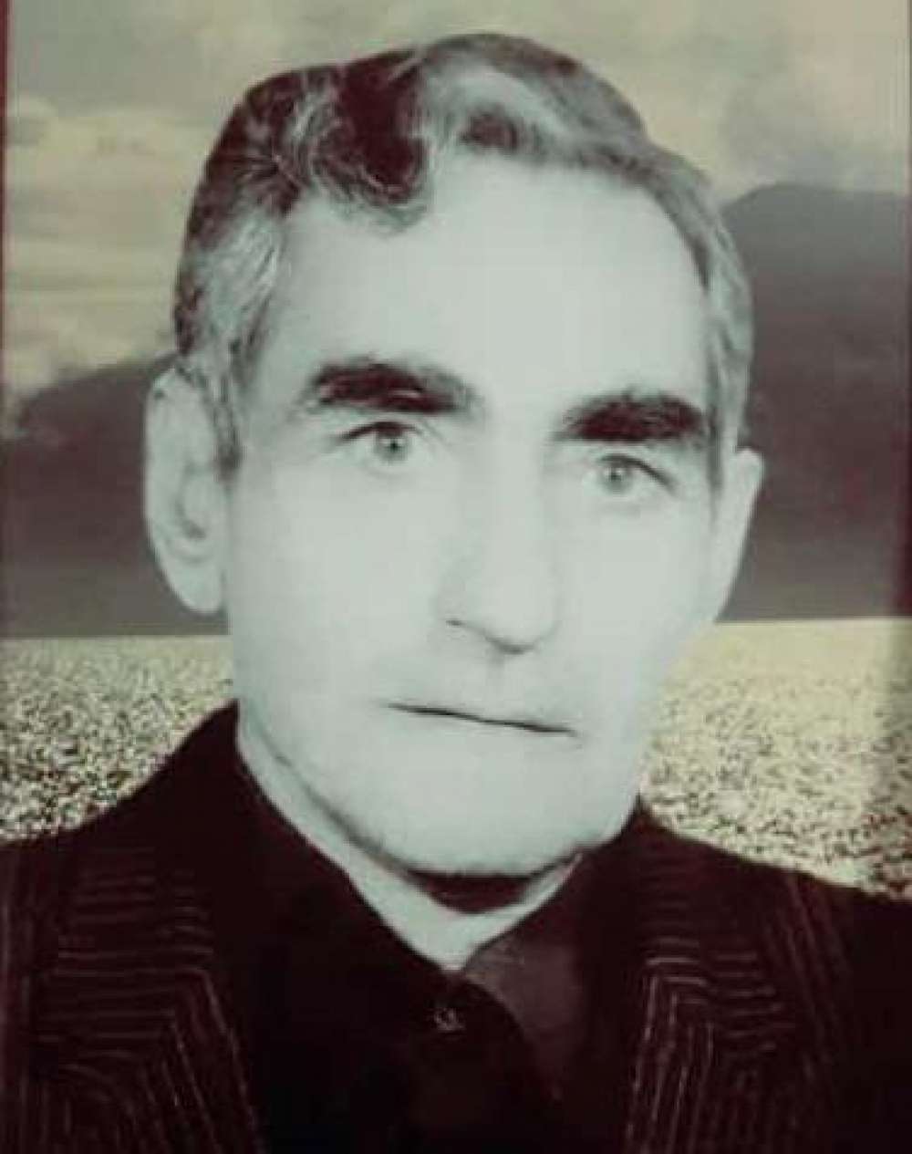 شادروان مرحوم ملا علمدار وشهید علی یار محمدی